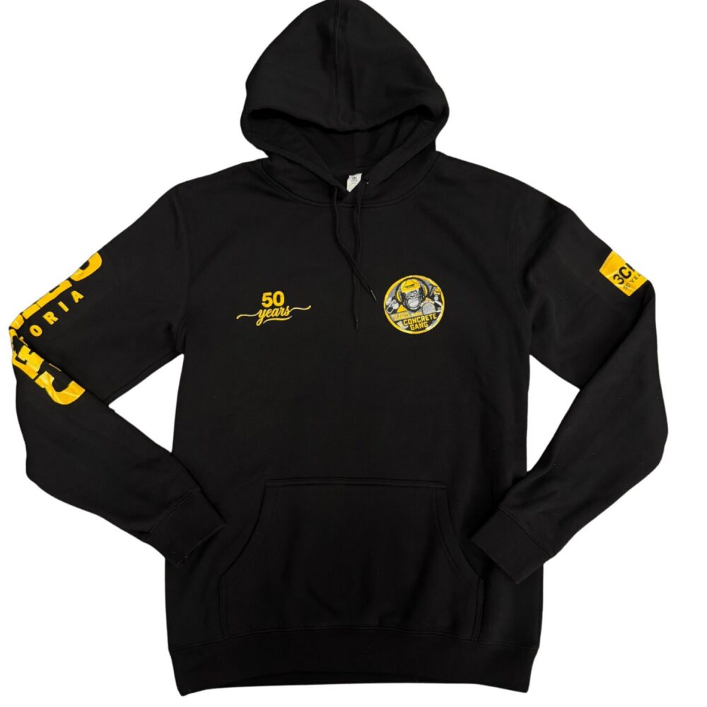 Black hoodie with yellow graphic patches: a circular logo on the chest and a small '50 years' script, yellow text along the left sleeve, and matching yellow branding on the right sleeve edge.