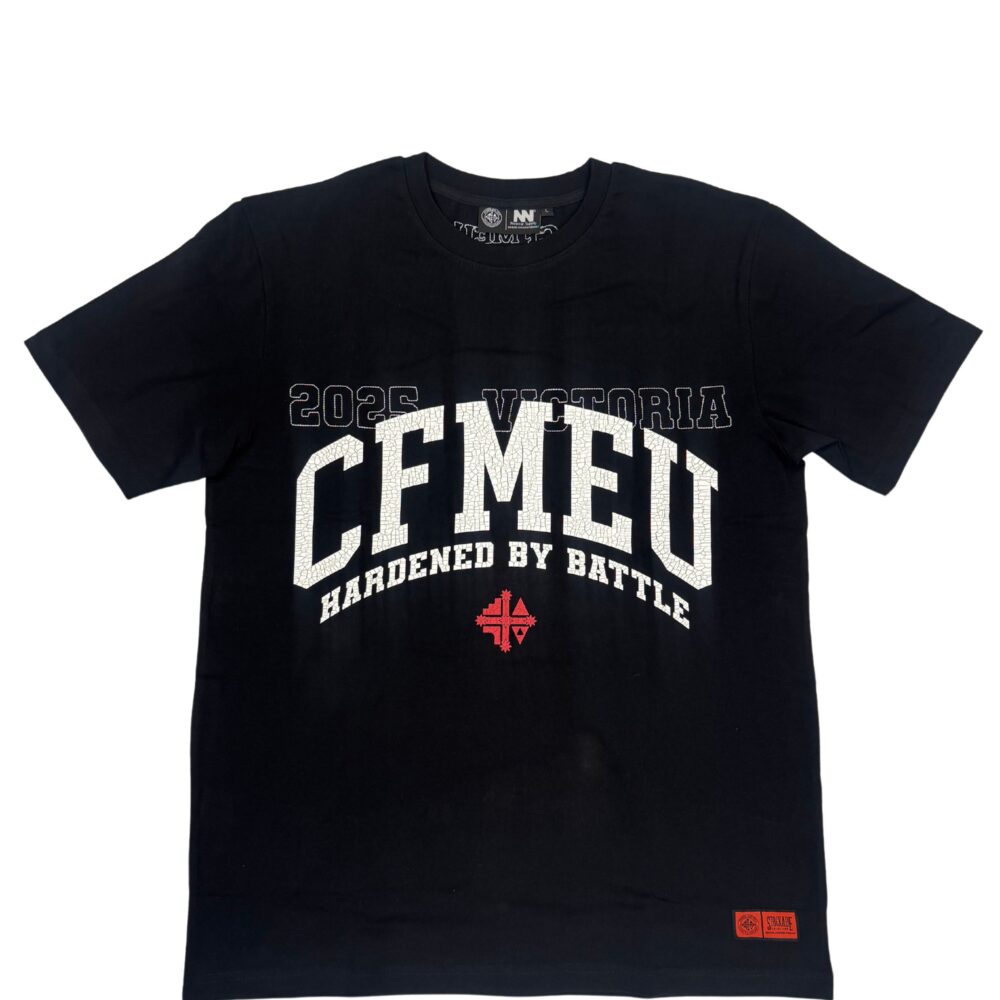 Black T-shirt with large cracked white text reading 'CEMENT' and 'Hardened by Battle' logo beneath, on a dark background